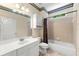 Bathroom with shower-tub combination and patterned wallpaper at 2001 Macland Square Dr # 11, Marietta, GA 30064