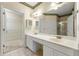 Bathroom showing the dual sink vanity and doorway to the walk-in closet at 2001 Macland Square Dr # 11, Marietta, GA 30064