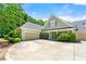 Charming single-Gathering home with a manicured front yard, complemented by an attached two-car garage at 2001 Macland Square Dr # 11, Marietta, GA 30064