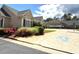 Well-maintained building exterior featuring manicured landscaping and accessible parking at 2001 Macland Square Dr # 11, Marietta, GA 30064