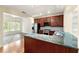 Well-equipped kitchen with granite countertops, stainless steel appliances, and a convenient breakfast bar at 2001 Macland Square Dr # 11, Marietta, GA 30064