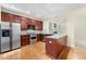 Modern kitchen featuring stainless steel appliances, granite countertops, and ample cabinet space for storage at 2001 Macland Square Dr # 11, Marietta, GA 30064