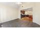 Open-concept living room and kitchen with hardwood and tile flooring at 2001 Macland Square Dr # 11, Marietta, GA 30064