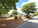 Landscaped community street view featuring mature trees, green lawns, and sidewalks at 2001 Macland Square Dr # 11, Marietta, GA 30064
