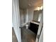 Bathroom featuring granite counters, and tub at 2363 Bear Mountain St, Lithonia, GA 30058