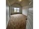 Spacious bedroom with vaulted ceiling and a large window at 2363 Bear Mountain St, Lithonia, GA 30058