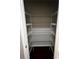 Walk-in closet with shelving and hardwood floors at 2363 Bear Mountain St, Lithonia, GA 30058