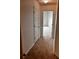 Hallway featuring neutral carpet and white doors at 2363 Bear Mountain St, Lithonia, GA 30058
