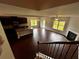 Open concept living and kitchen area with hardwood floors at 2363 Bear Mountain St, Lithonia, GA 30058