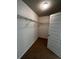 Walk-in closet featuring carpeted floor and white wire shelving at 2363 Bear Mountain St, Lithonia, GA 30058