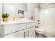 Bright bathroom with a single sink vanity, and modern finishes at 2406 Lakeshore Ln, Atlanta, GA 30316