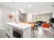Bright kitchen with stainless steel appliances, center island, and open layout to the living room at 2406 Lakeshore Ln, Atlanta, GA 30316