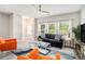 Cozy living room featuring modern furniture, large windows, and stylish decor at 2406 Lakeshore Ln, Atlanta, GA 30316