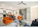Open concept living space with hardwood floors, a modern kitchen, and a staircase at 2406 Lakeshore Ln, Atlanta, GA 30316