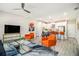 Inviting living space featuring a modern kitchen, hardwood floors, and contemporary furniture at 2406 Lakeshore Ln, Atlanta, GA 30316