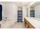 Well-lit bathroom featuring a shower, a vanity with drawers, and a neutral color scheme at 4746 Mulberry Rock Rd, Dallas, GA 30157
