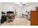 Bedroom featuring a ceiling fan, a large window, and neutral-toned walls at 4746 Mulberry Rock Rd, Dallas, GA 30157
