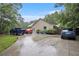 Spacious driveway offers ample parking, enhanced by fresh landscaping and easy access to the home's entrance at 4746 Mulberry Rock Rd, Dallas, GA 30157