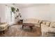 Traditional living room boasts plush seating, a large window, and ample natural light at 4746 Mulberry Rock Rd, Dallas, GA 30157