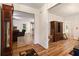 Bright living room with hardwood floors, white walls, and a view of other living spaces at 4746 Mulberry Rock Rd, Dallas, GA 30157