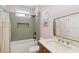 Charming bathroom with tub and shower, stylish mirror and vanity at 1971 Centennial Rd, Rutledge, GA 30663