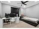 Modern bedroom featuring a sleek platform bed, gaming setup, and LED lighting accents at 1971 Centennial Rd, Rutledge, GA 30663