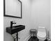 Contemporary powder room showcasing matte black fixtures, and a modern sink at 1971 Centennial Rd, Rutledge, GA 30663