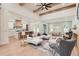 Open-concept living space with a kitchen island, adjacent to the living and dining areas at 2625 Beverly Ln, Snellville, GA 30078