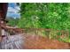 Wood deck overlooking trees and sky at 2905 Cammie Wages Rd, Dacula, GA 30019