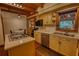 Functional kitchen showcasing stainless appliances, center island cooktop, and ample counter space at 2905 Cammie Wages Rd, Dacula, GA 30019