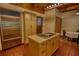 Spacious kitchen with center island cooktop and plenty of counter space at 2905 Cammie Wages Rd, Dacula, GA 30019