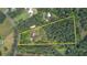 Aerial view of the property lines for this treelined home at 2905 Cammie Wages Rd, Dacula, GA 30019