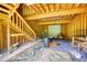 Unfinished shed interior, showcasing the frame, stairs, lighting, and storage capabilities at 2905 Cammie Wages Rd, Dacula, GA 30019