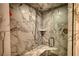 Modern tiled shower featuring marble-patterned walls, a glass door, and a comfortable built-in seat at 2905 Cammie Wages Rd, Dacula, GA 30019