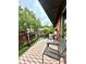Charming balcony with a checkered rug and peaceful neighborhood views, perfect for relaxation at 6851 Roswell Rd # D33, Atlanta, GA 30328