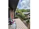 Cozy balcony with a table and chairs, perfect for enjoying outdoor space and neighborhood views at 6851 Roswell Rd # D33, Atlanta, GA 30328