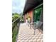 Relaxing balcony with outdoor seating and views of lush greenery for peaceful enjoyment at 6851 Roswell Rd # D33, Atlanta, GA 30328