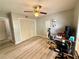 Bedroom with ceiling fan, neutral paint, closet and lots of natural light from a window at 6851 Roswell Rd # D33, Atlanta, GA 30328