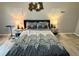 Bedroom with neutral paint, wood style flooring, and decorative accents at 6851 Roswell Rd # D33, Atlanta, GA 30328