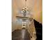 Elegant entryway featuring a chandelier, staircase, and classic architectural details at 6851 Roswell Rd # D33, Atlanta, GA 30328