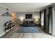 Cozy living room with hardwood floors, modern decor, and an inviting atmosphere at 6851 Roswell Rd # D33, Atlanta, GA 30328