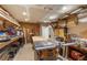 Basement workshop features a workbench and extensive storage at 999 Bailey Rd, Woodstock, GA 30188