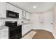 Basement kitchen with modern appliances and sleek countertops at 999 Bailey Rd, Woodstock, GA 30188