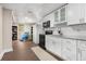 Well-equipped basement kitchen with a playful area in the background at 999 Bailey Rd, Woodstock, GA 30188
