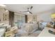 Comfortable bedroom with neutral tones, ceiling fan, and natural light from the windows at 2762 Whispering Pines Dr, Decatur, GA 30033