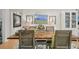 Cozy dining room featuring a large wooden table, comfortable seating, and elegant decor at 2762 Whispering Pines Dr, Decatur, GA 30033