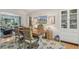 Inviting dining room featuring a rustic wooden table, elegant decor, and natural light at 2762 Whispering Pines Dr, Decatur, GA 30033