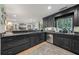 Well-equipped kitchen features dark cabinets, stainless steel appliances, and an open layout at 2762 Whispering Pines Dr, Decatur, GA 30033