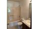 Bathroom features a vanity, toilet, and tub with shower head at 285 Woodland St, Dallas, GA 30157