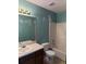 Bathroom features a vanity and a shower-tub combination with tile surround at 285 Woodland St, Dallas, GA 30157